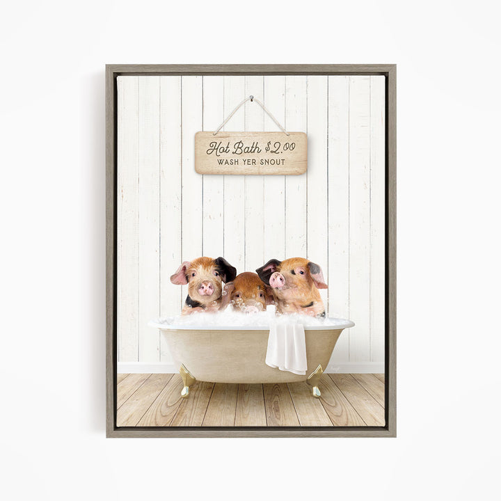 A framed image of three pigs sitting in a bathtub, with a wooden sign above them that reads "Hot Bath $2.00 WASH YER SNOUT".