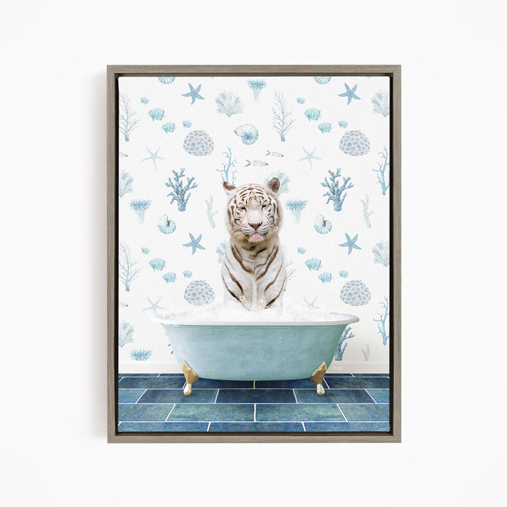 A white tiger is sitting in a blue bathtub, surrounded by a pattern of blue and white seashells, starfish, and coral.