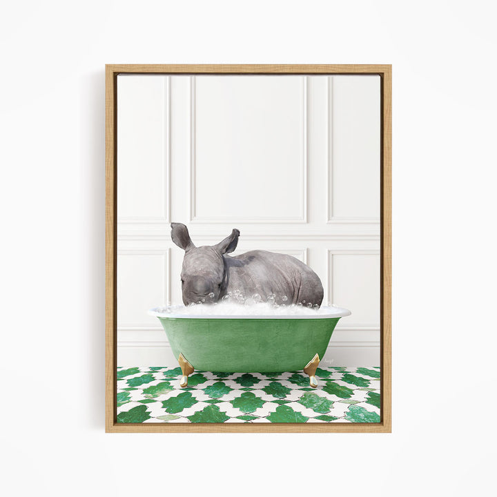 A rhinoceros is sitting in a green bathtub filled with water, surrounded by a green and white patterned floor.