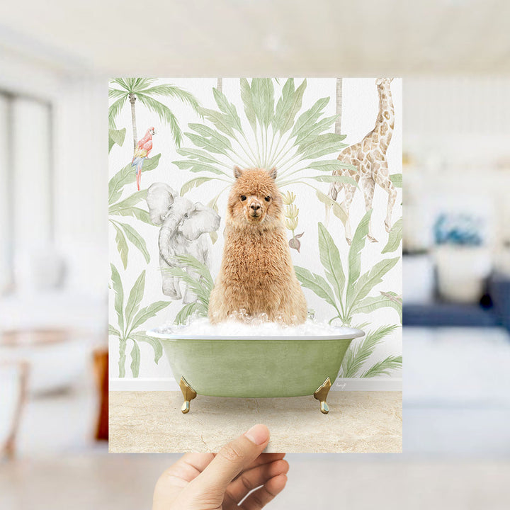 A hand holds up a framed image depicting a small brown dog sitting in a green bathtub, surrounded by tropical foliage and animals.