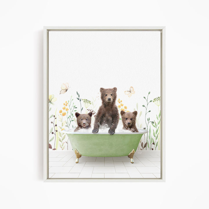 A framed illustration depicting three bears sitting in a green bathtub filled with water, surrounded by flowers and butterflies.