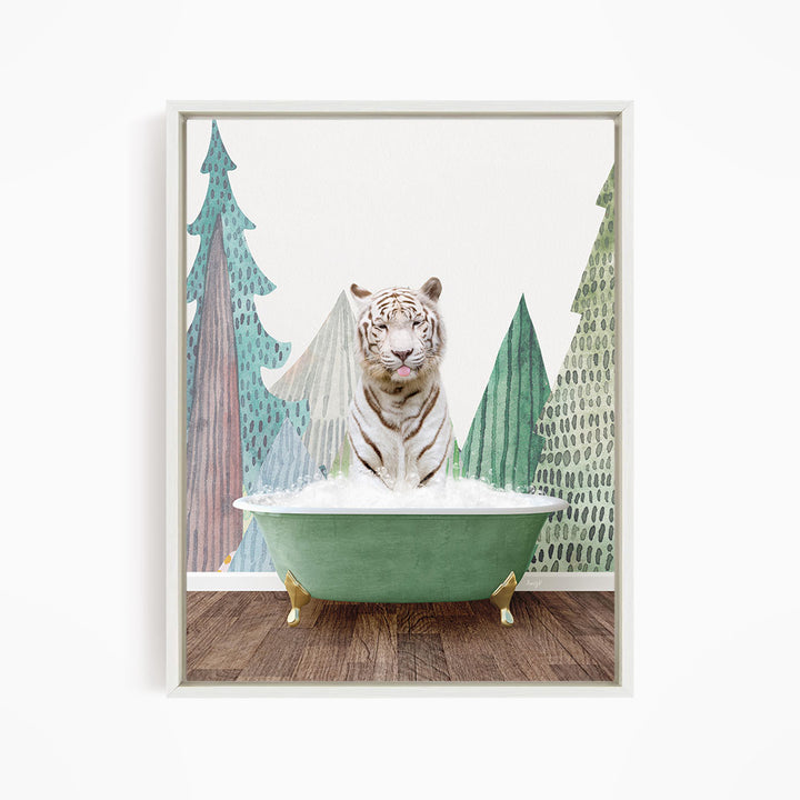 A white tiger is sitting in a green bathtub, surrounded by trees with a snowy landscape in the background.