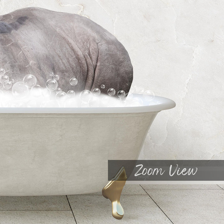 A large gray rhinoceros is partially submerged in a bathtub filled with bubbles, creating a whimsical and playful scene.