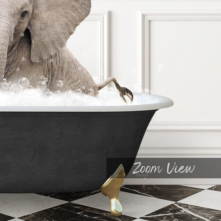 A large elephant is sitting in a bathtub filled with bubbles, with its foot in the water.