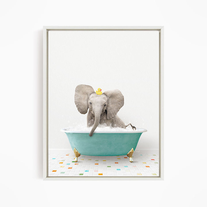 A gray elephant is sitting in a blue bathtub, with a yellow rubber duck perched on its head.