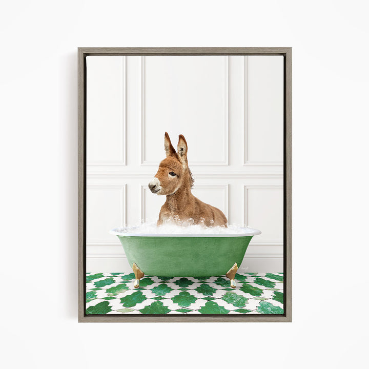 A donkey is sitting in a green bathtub filled with water, surrounded by a patterned floor.