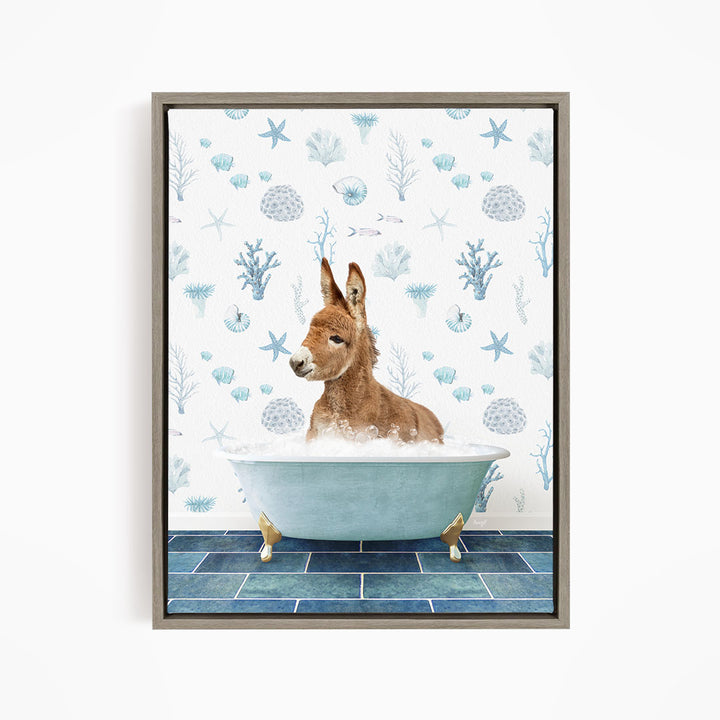 A donkey is sitting in a blue bathtub filled with bubbles, surrounded by a pattern of seashells, starfish, and other marine life.