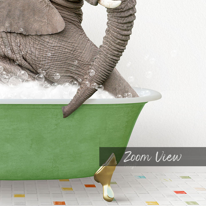 A large elephant is sitting in a green bathtub filled with bubbles, with its trunk submerged in the water.
