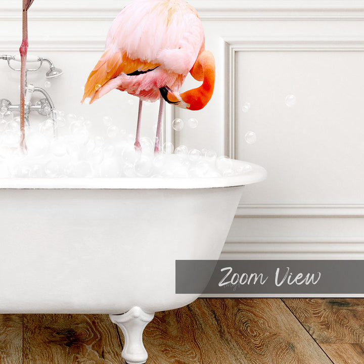 A pink flamingo standing in a white bathtub filled with bubbles, creating a whimsical and playful scene.