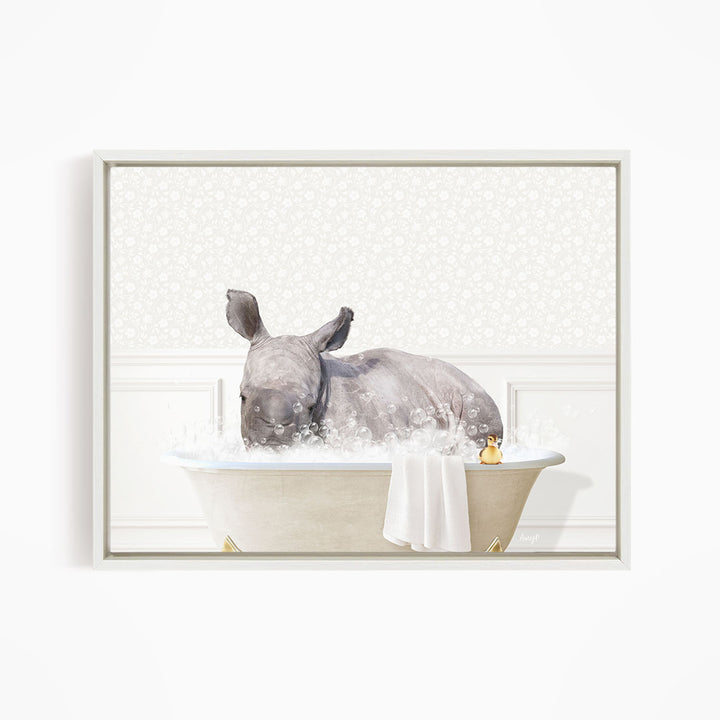 A rhinoceros is sitting in a bathtub filled with water, surrounded by bubbles, creating a whimsical and playful scene.