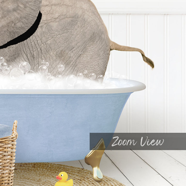 A gray elephant is taking a bath in a blue tub, surrounded by bubbles and a yellow rubber duck.