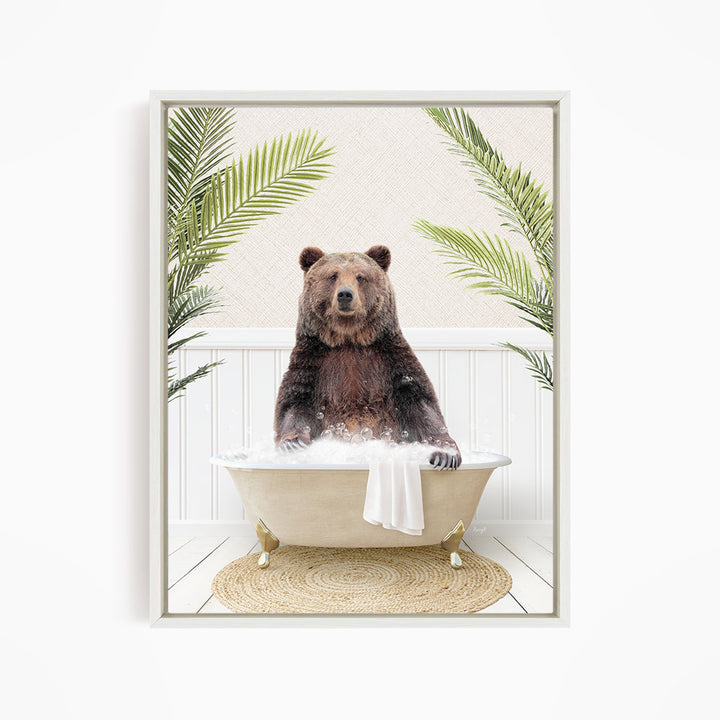 A brown bear sitting in a bathtub filled with water, surrounded by palm leaves.