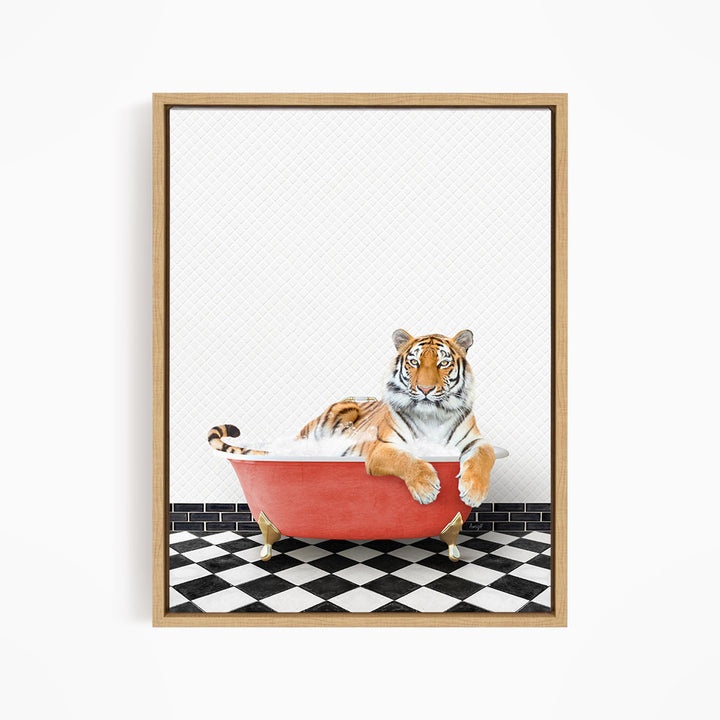 A tiger is sitting in a red bathtub, surrounded by a black and white checkered floor.