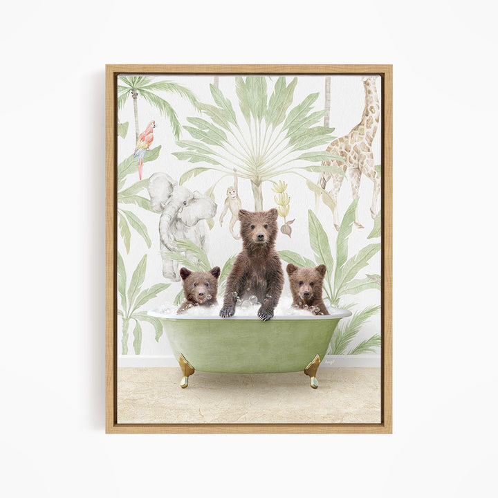 A framed print depicting three bears sitting in a green bathtub, surrounded by tropical foliage and animals.