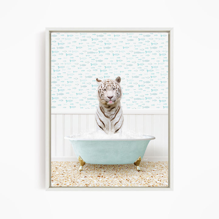 A white tiger is sitting in a light blue bathtub filled with water, surrounded by a pattern of small fish.