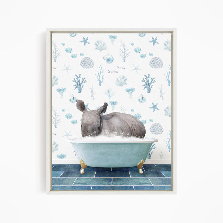 A rhinoceros is sitting in a blue bathtub filled with water, surrounded by a pattern of blue and white seashells and starfish.