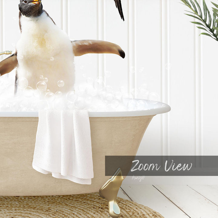 A penguin sitting in a bathtub filled with bubbles, with a towel draped over its body.