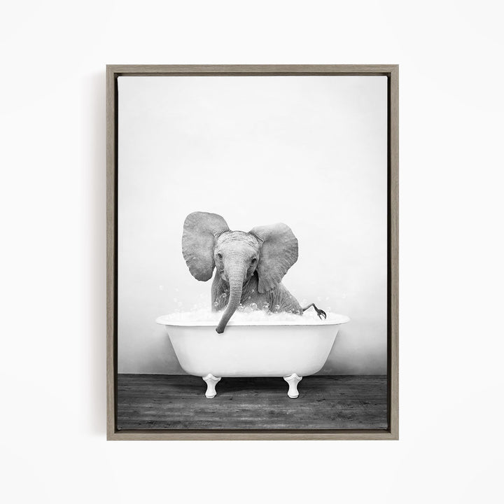 A baby elephant sitting in a bathtub filled with water, creating a playful and whimsical scene.