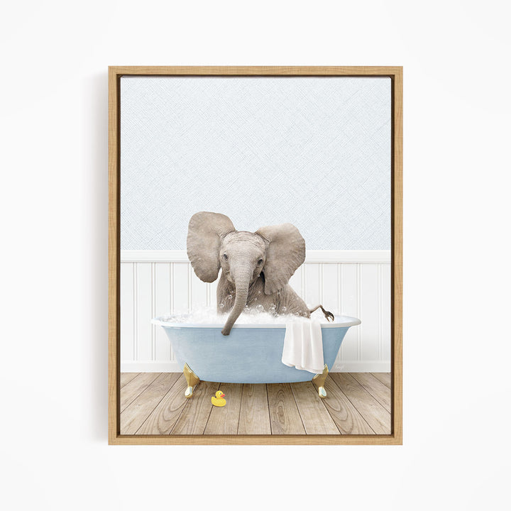 A baby elephant sitting in a blue bathtub filled with water, surrounded by rubber ducks.