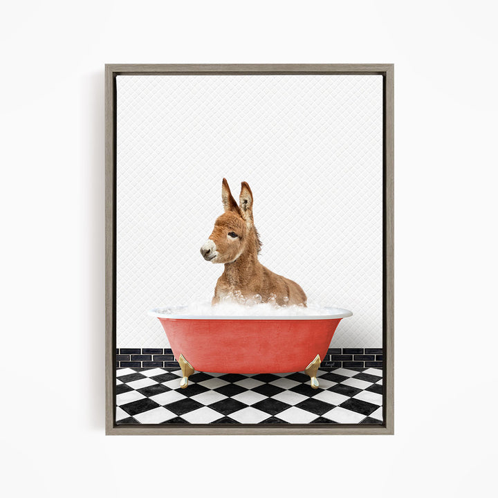 A donkey is sitting in a red bathtub filled with water, surrounded by a black and white checkered floor.