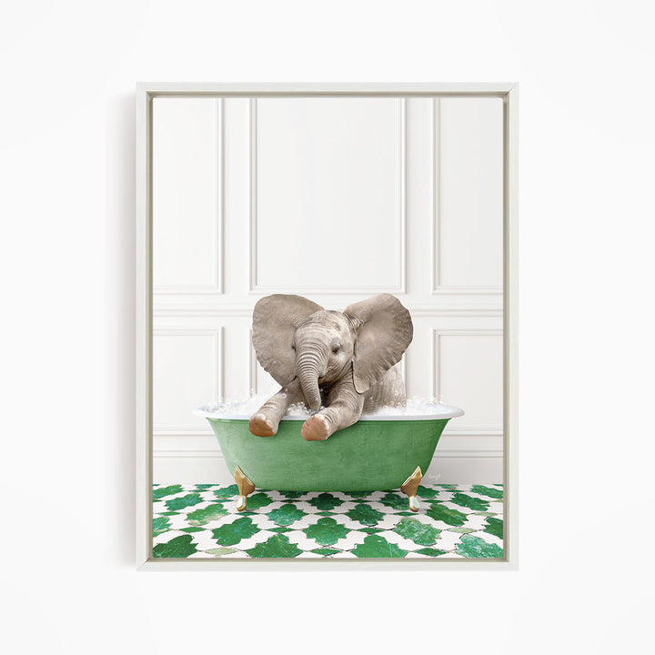 A baby elephant sitting in a green bathtub filled with water, surrounded by a green and white patterned floor.