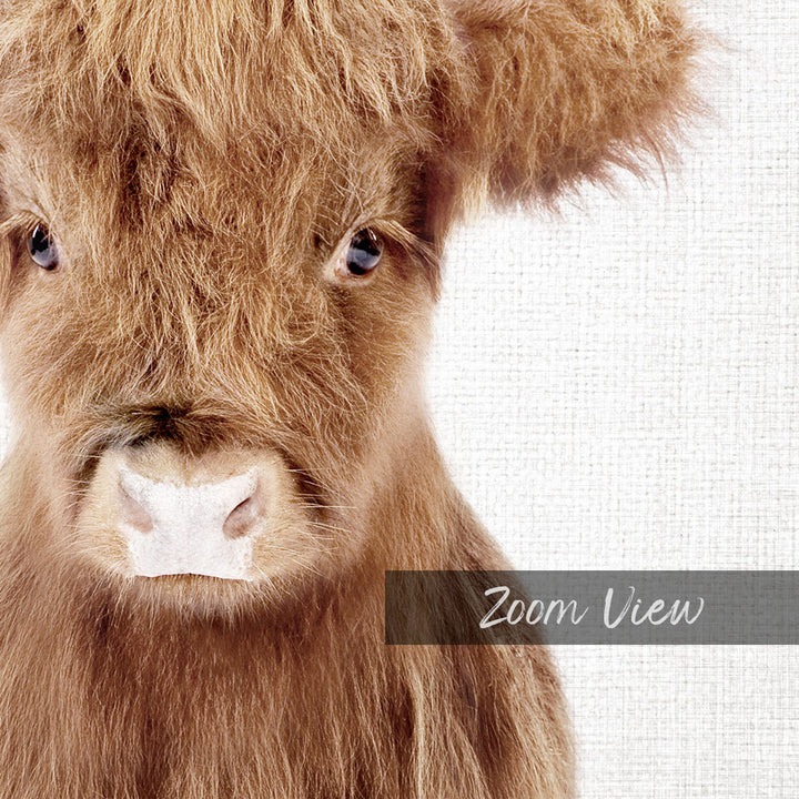 A close-up of a brown cow's face, with its eyes and nose prominently featured.