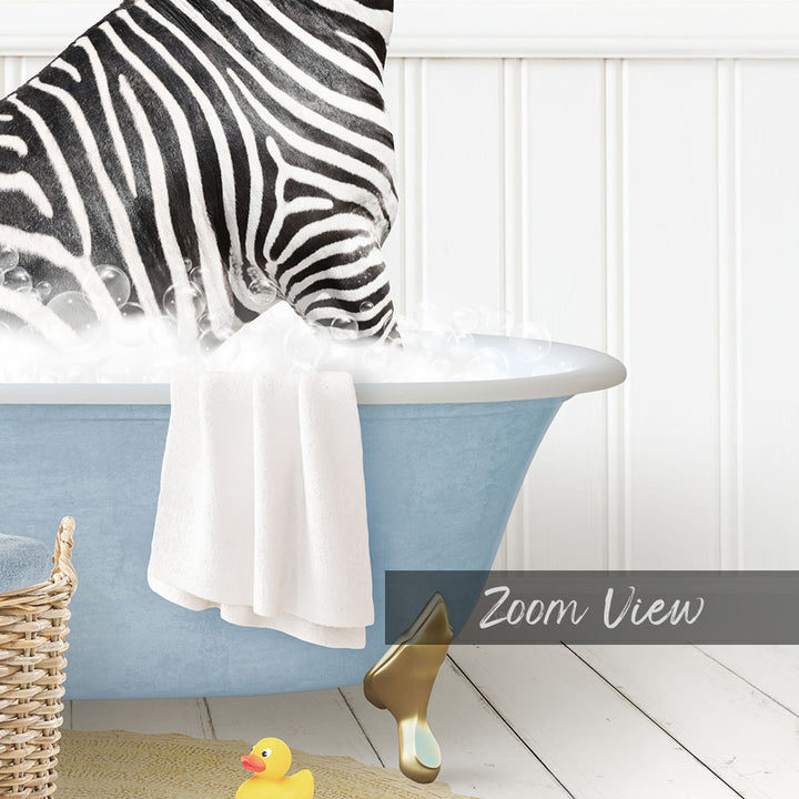 A zebra standing in a blue bathtub filled with water, surrounded by a yellow rubber duck and a white towel.