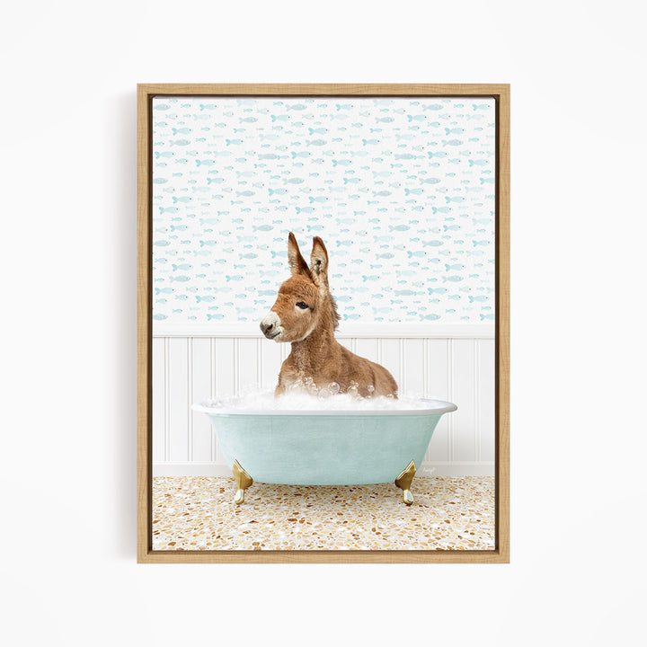 A donkey is sitting in a bathtub filled with water, surrounded by a patterned wall.