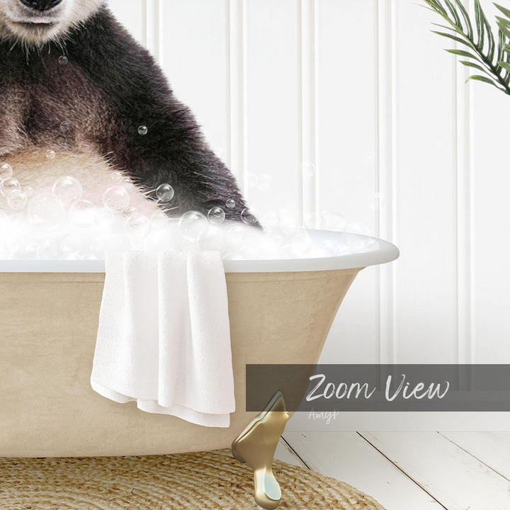 A panda bear sitting in a bathtub filled with bubbles, with a towel and a gold object nearby.