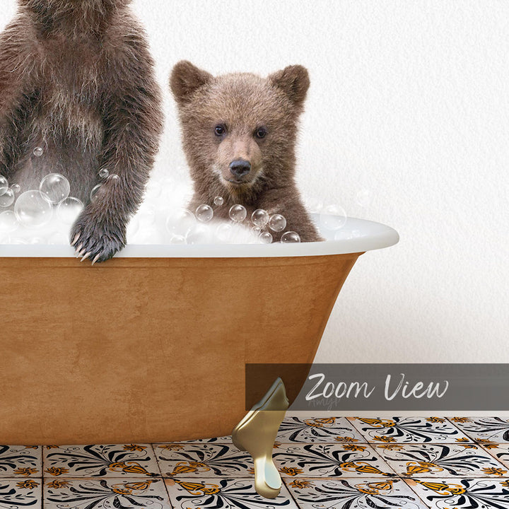 A young bear cub sitting in a bathtub filled with bubbles, with a text overlay that reads "Zoom View".