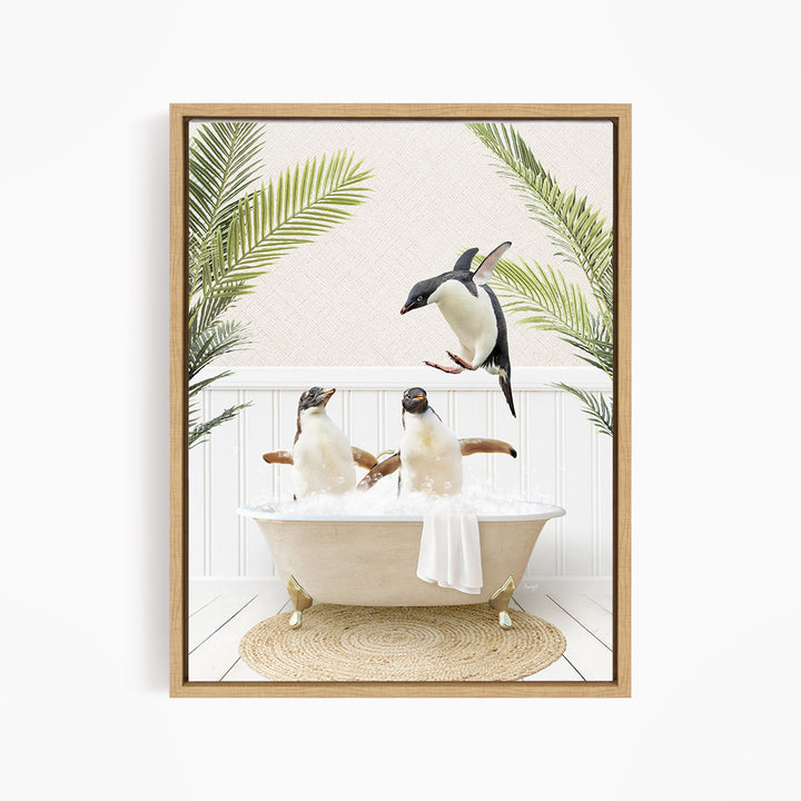 A framed image depicting three penguins sitting in a bathtub, surrounded by palm leaves, creating a whimsical and playful scene.