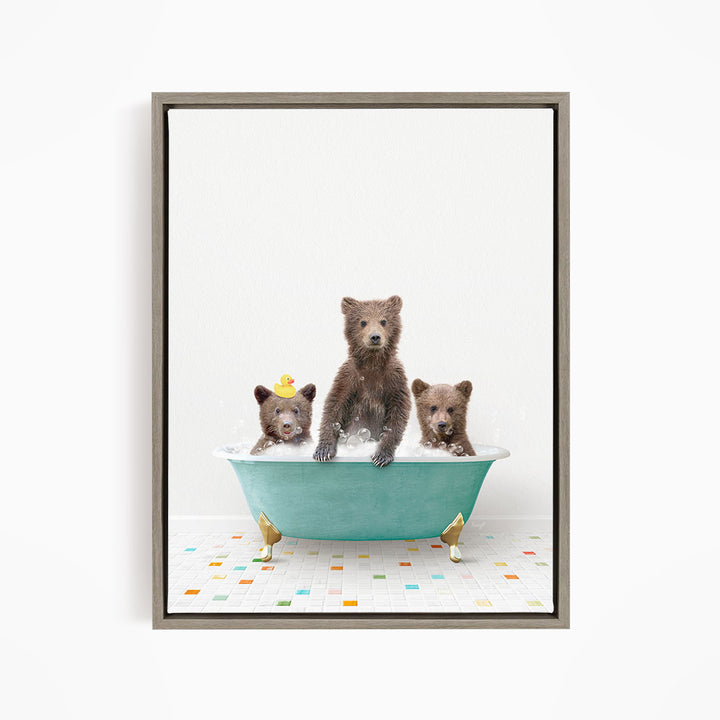 A framed image depicting three bears sitting in a bathtub filled with water, with one bear sitting in the center and two bears sitting on either side.