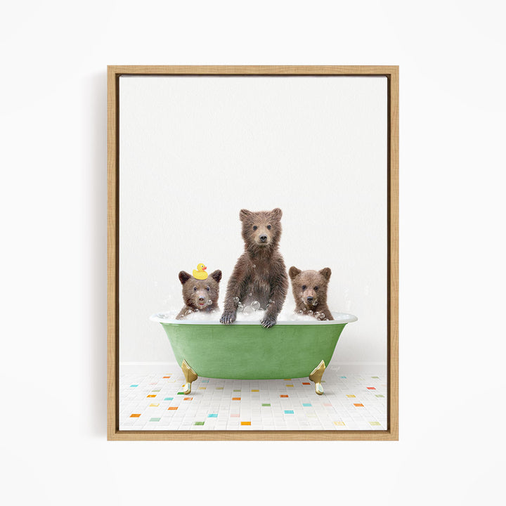 A framed image depicting three bears sitting in a green bathtub, with one bear sitting in the center and two bears sitting on either side.