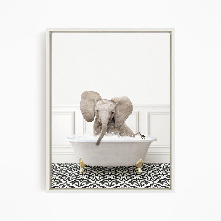 A gray elephant is sitting in a white bathtub filled with water, surrounded by a black and white patterned floor.