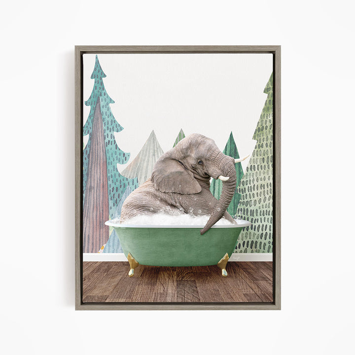 A gray elephant is sitting in a green bathtub, surrounded by a forest-like background with trees and a snowy landscape.