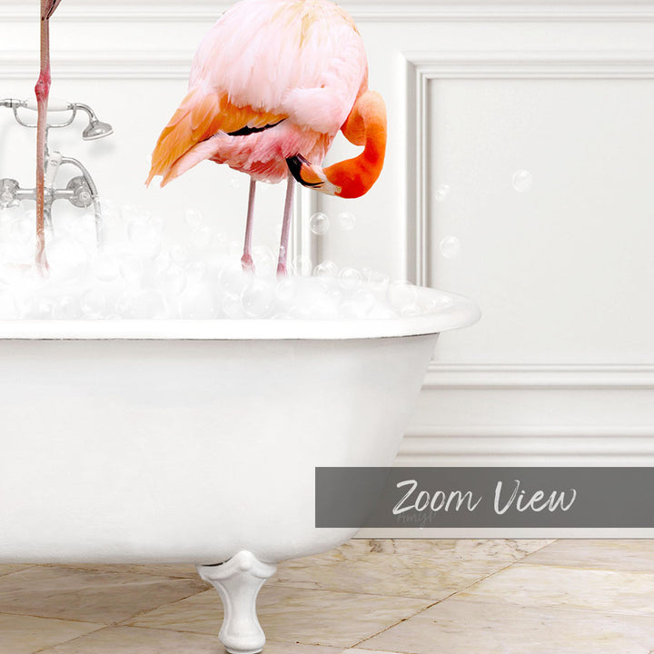A pink flamingo standing in a white bathtub filled with water, surrounded by bubbles.