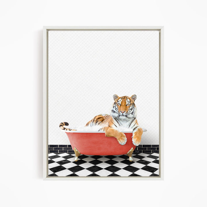 A tiger is sitting in a red bathtub on a black and white checkered floor.