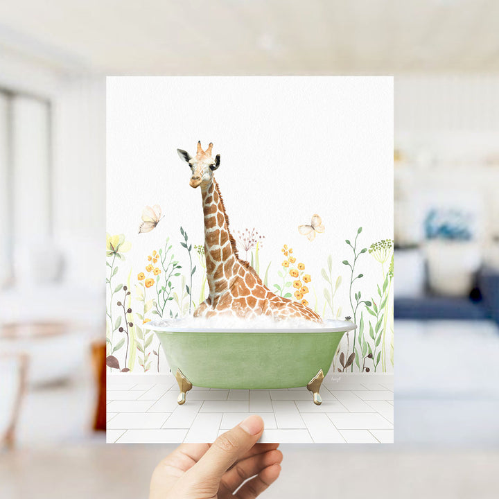 A giraffe sitting in a green bathtub filled with bubbles, surrounded by flowers and butterflies, is the focus of the image.