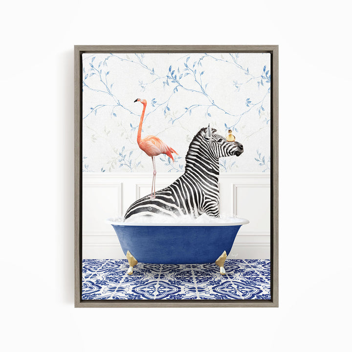 A zebra sitting in a blue bathtub, with a pink flamingo standing on its back, against a floral wallpaper background.