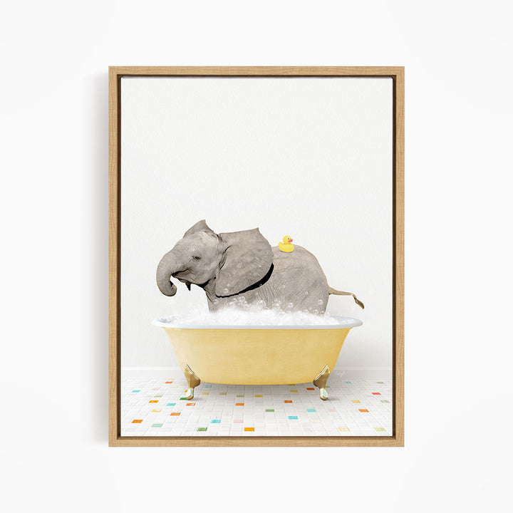 A gray elephant is sitting in a yellow bathtub filled with water, with a yellow rubber duck floating on its back.