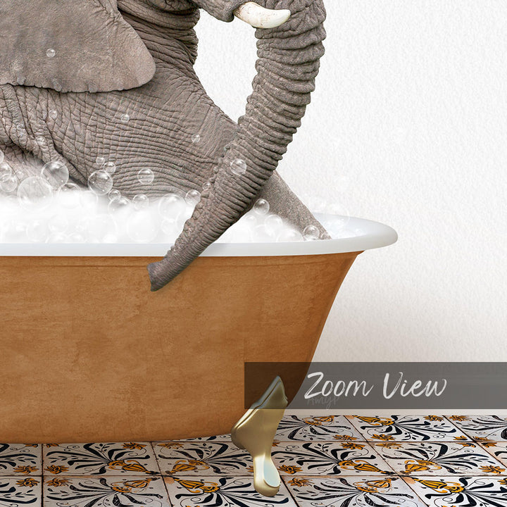 A large elephant is sitting in a bathtub filled with bubbles, with a gold-colored bathtub leg visible.