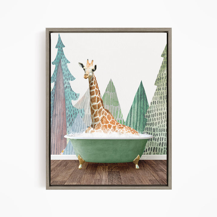 A giraffe is sitting in a green bathtub, surrounded by trees and mountains in the background.