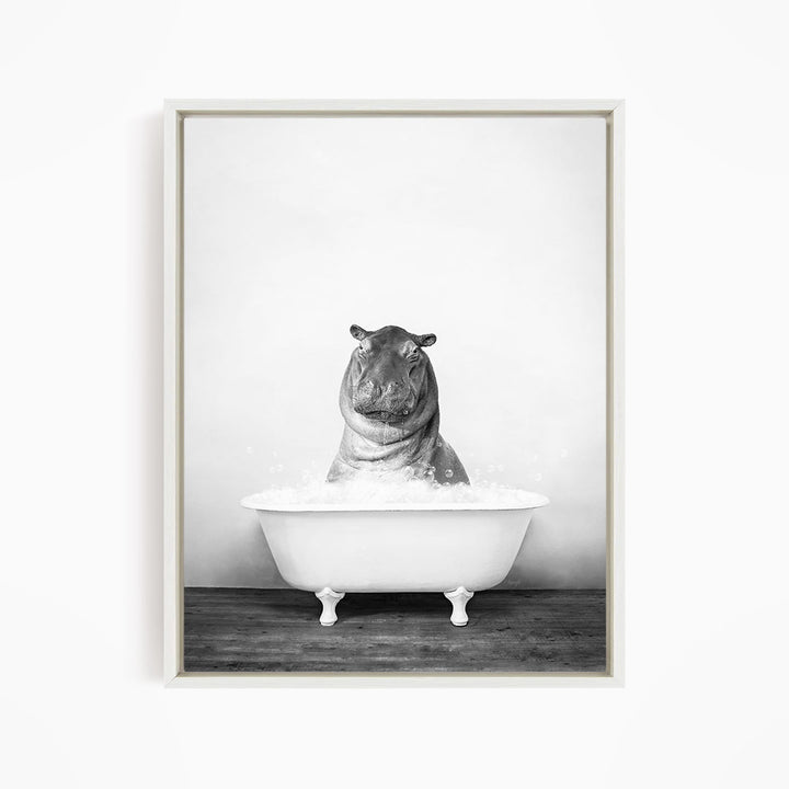 A hippopotamus sitting in a bathtub filled with water, creating a whimsical and humorous scene.