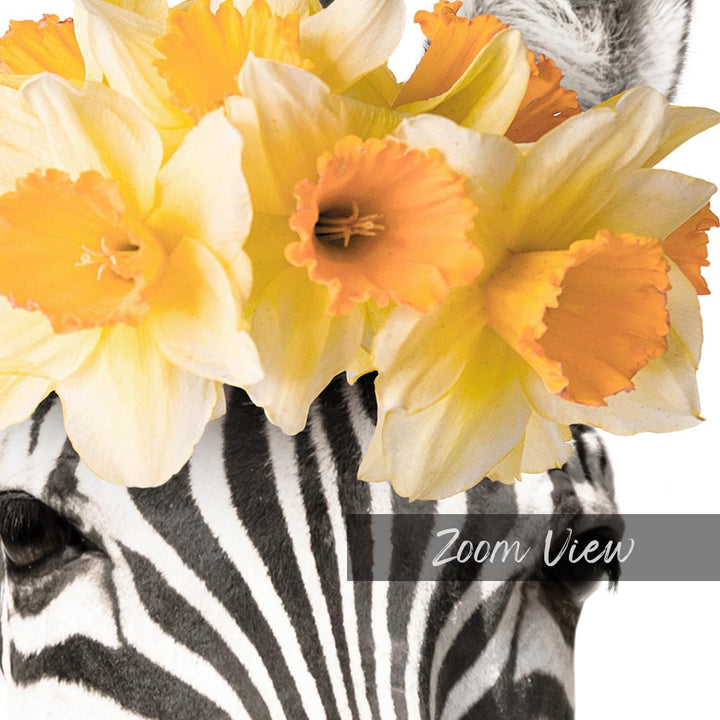 a close up of a zebra with flowers on its head