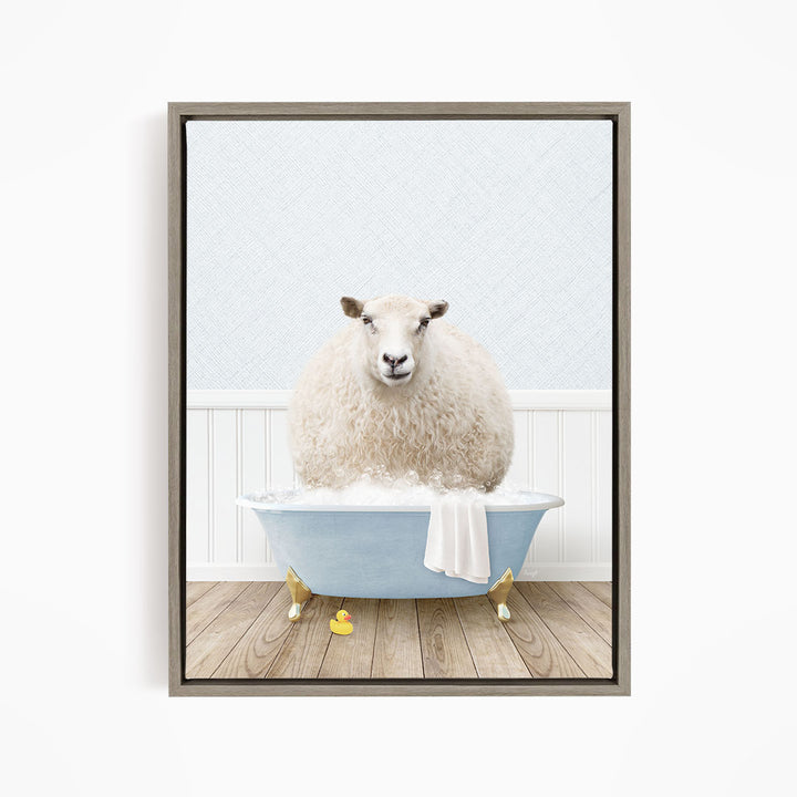 A fluffy white sheep sits in a blue bathtub filled with bubbles, surrounded by yellow rubber duckies.