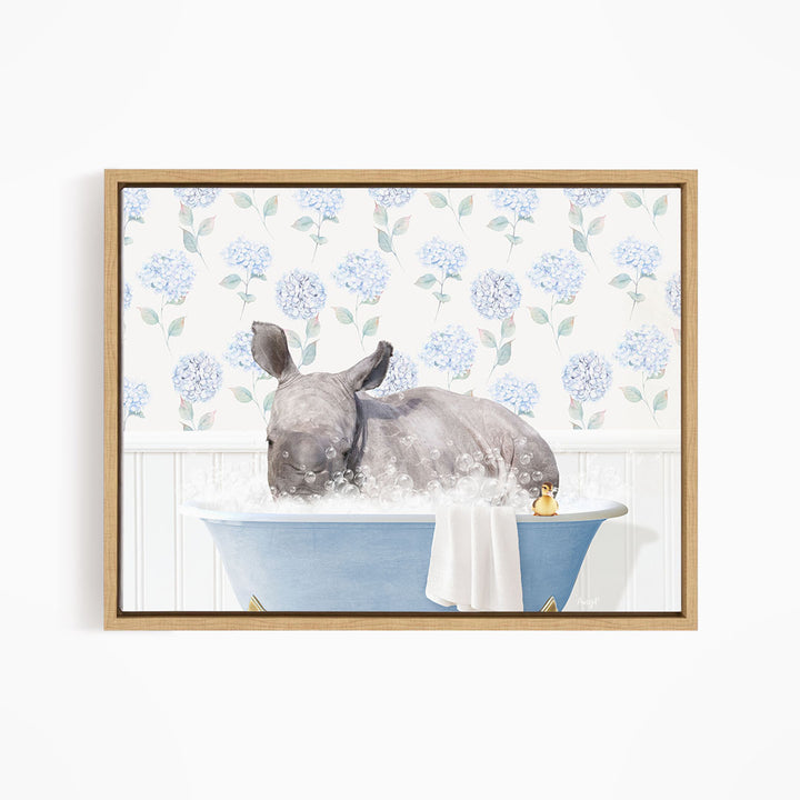 A rhinoceros is sitting in a blue bathtub filled with water, surrounded by blue flowers on the wall behind it.
