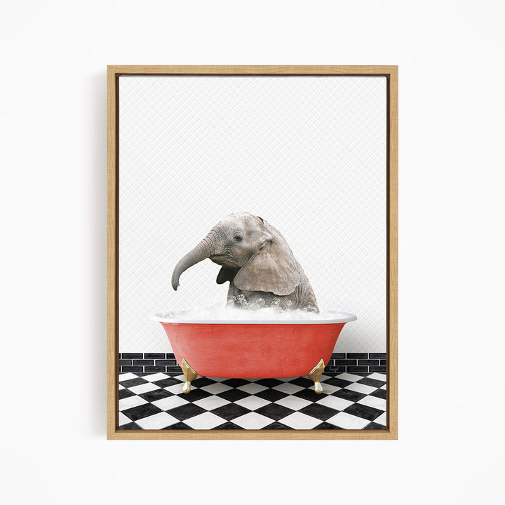 A baby elephant sitting in a red bathtub filled with water, surrounded by a black and white checkered floor.