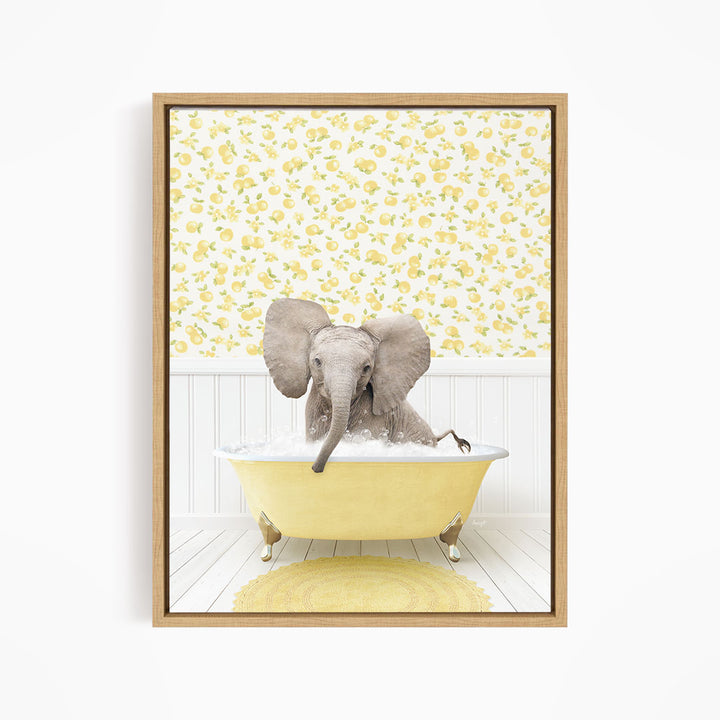 A baby elephant sitting in a yellow bathtub filled with water, surrounded by a yellow floral pattern on the wall behind it.