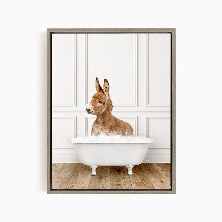 A donkey is sitting in a white bathtub filled with bubbles, creating a playful and whimsical scene.