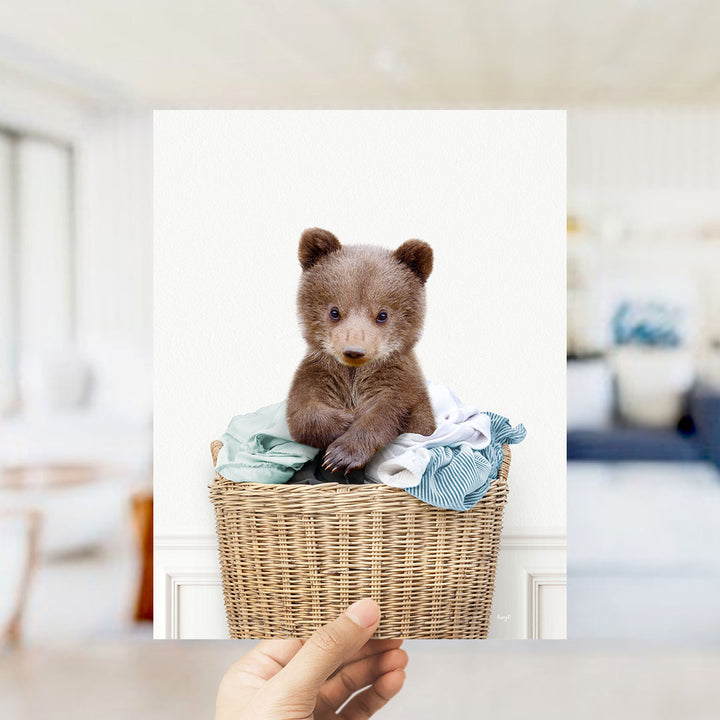 Baby Bear in Laundry Basket - Simple White Wall